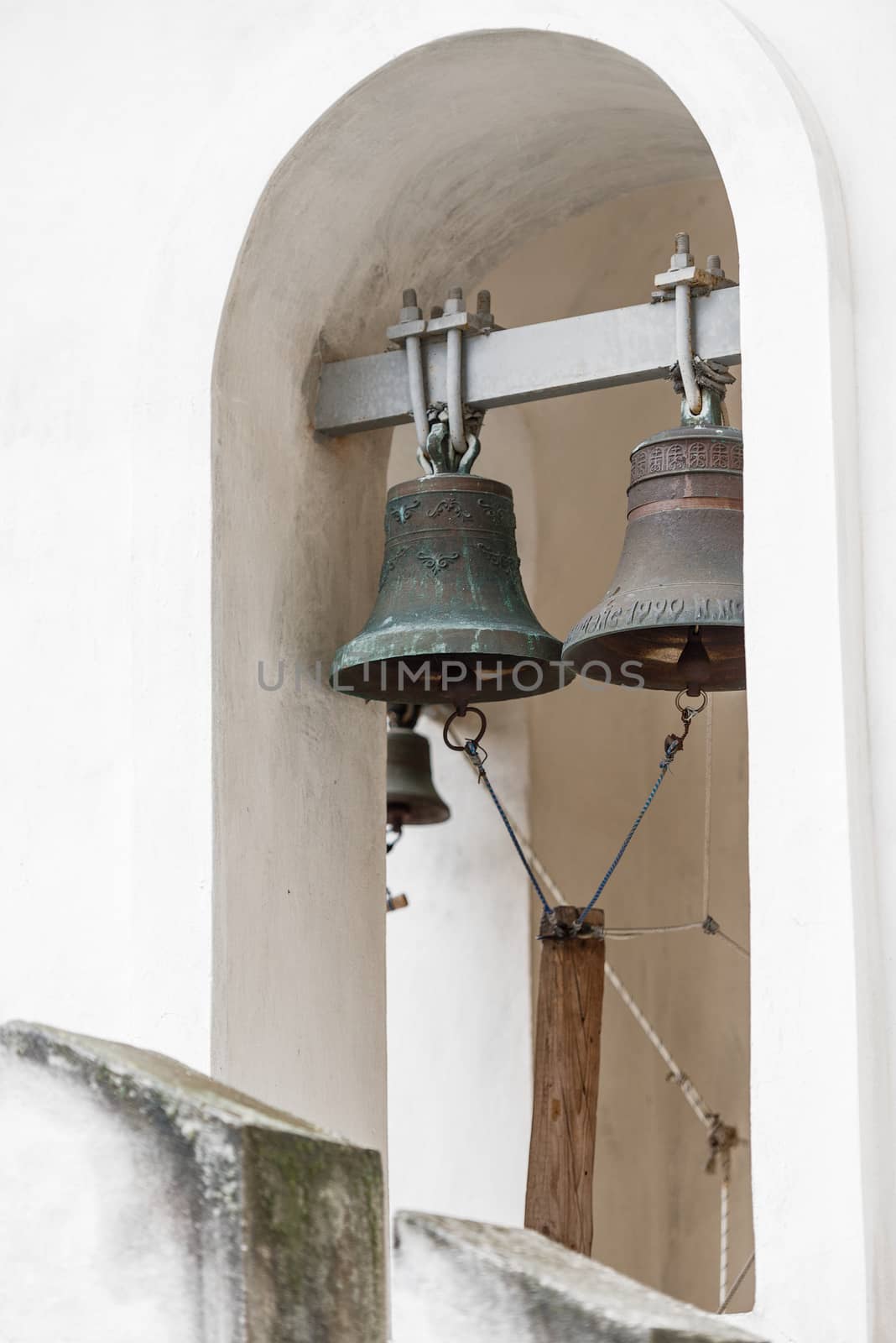 Close-up of heavy bells in the belfry of the Russian Orthodox Church