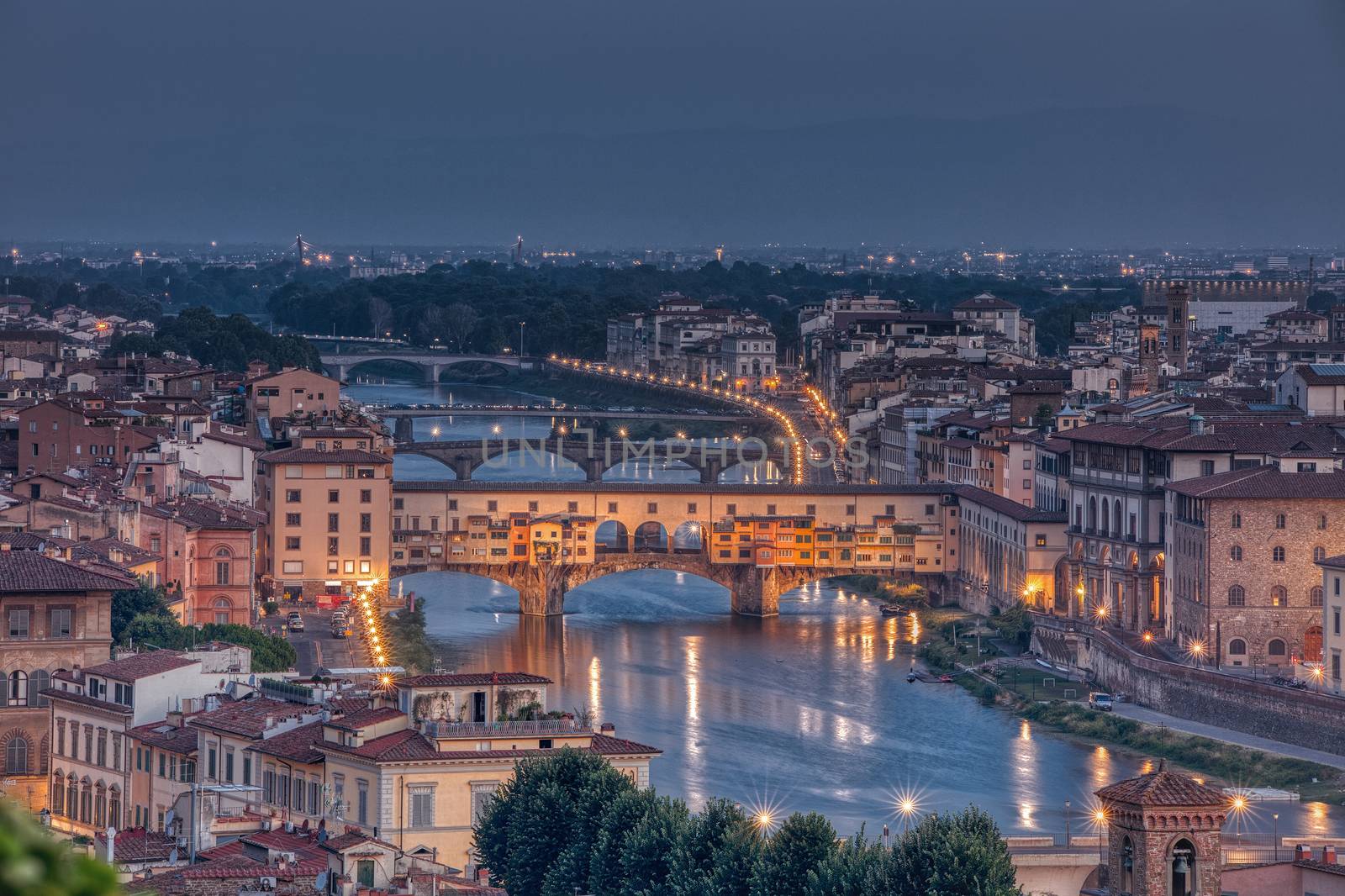 Ponte Vecchio over the Arno River in Florence, Tuscany, Italy. 