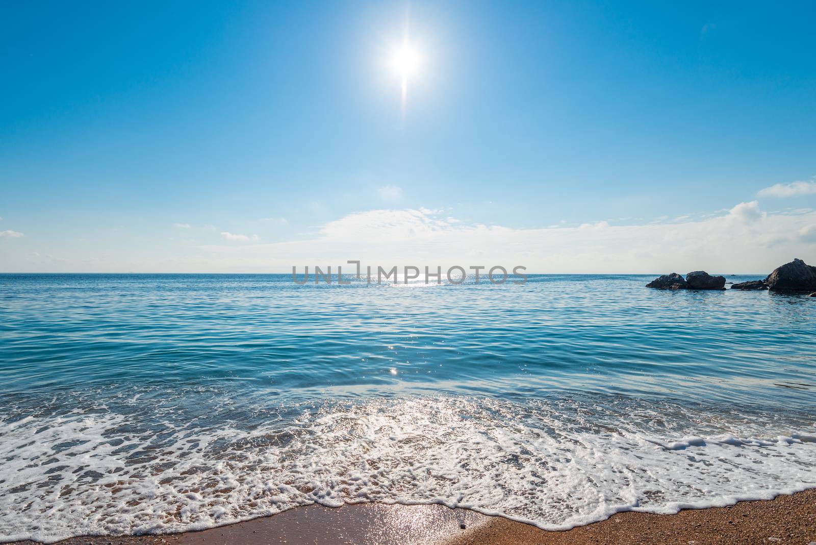 The seascape is a bright midday sun over clear sea water, a view by kosmsos111