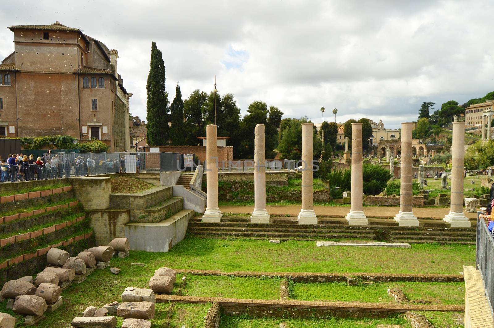 View of the Roman Forum in Rome, Italy. The Roman forum is one of the main tourist destinations in Europe. Beautiful panorama of the Roman Forum in summer. Ancient ruins in the center of Rome.