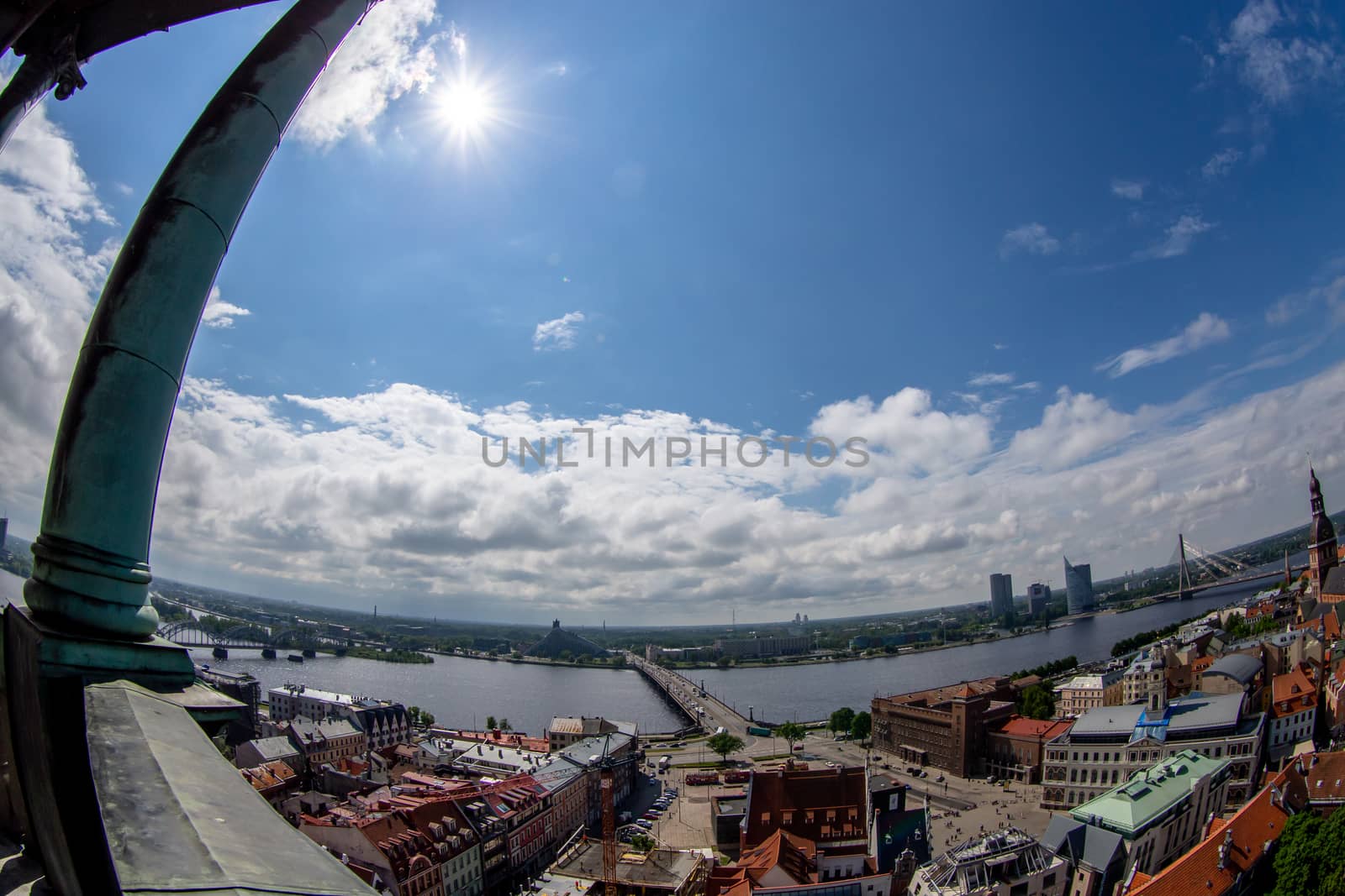 Fisheye aerial view of Riga city from st. Peter's church in Latvia. Panoramic view of Riga with cloudy blue sky. Fisheye lens.