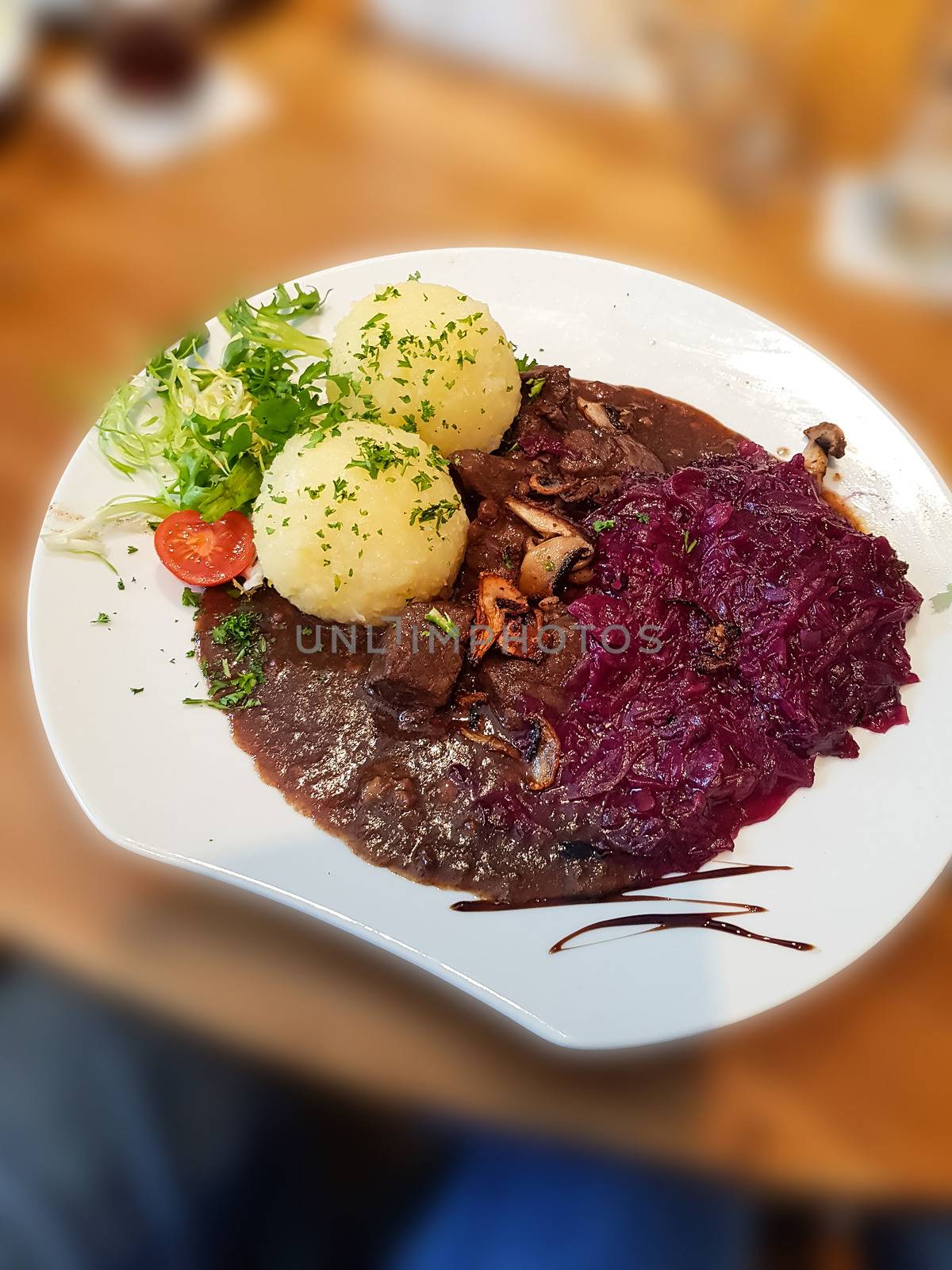 Gourmet game fillet with potato dumplings, goulash garnished