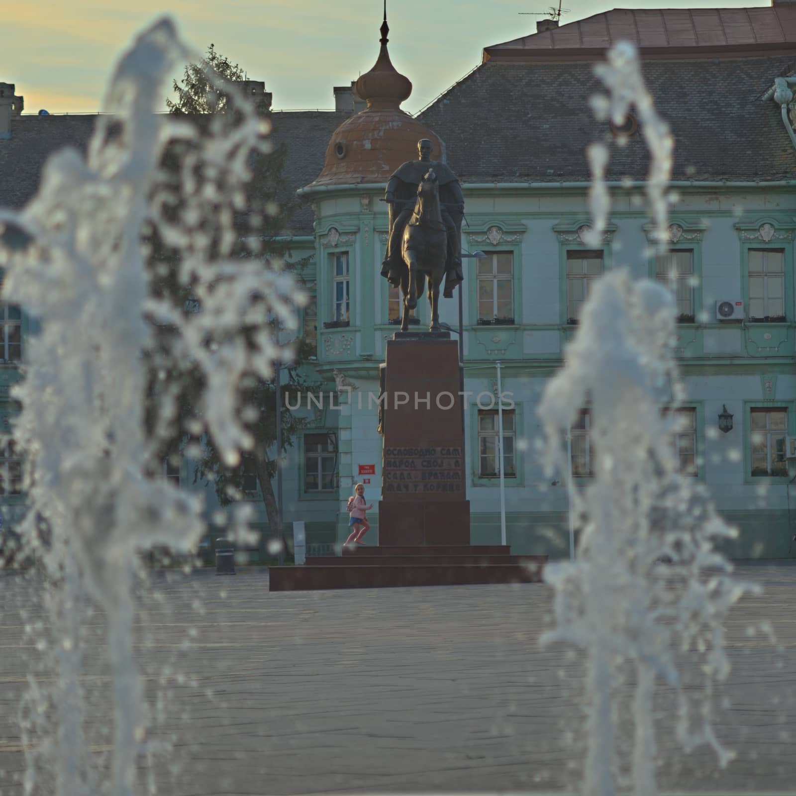 ZRENJANIN, SERBIA, OCTOBER 14th 2018 - Monument of King Peter between fountain water jets