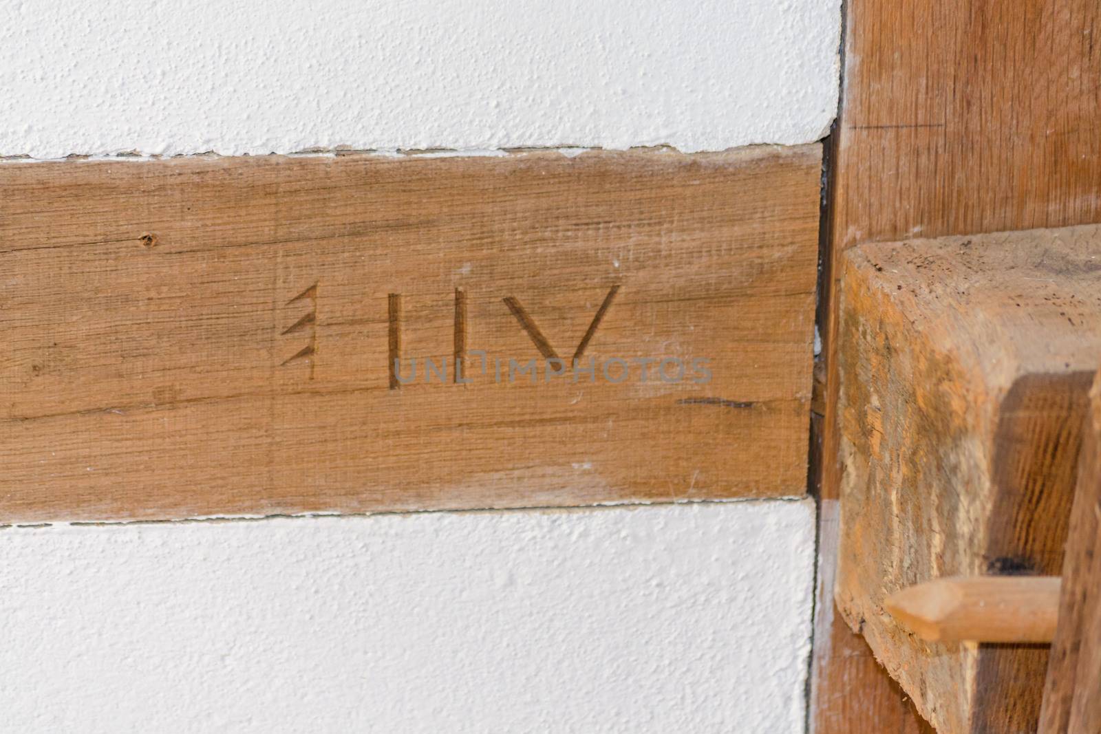 Old historic half-timbered beams with signs so-called Abbundzeichen - Bundzeichen.