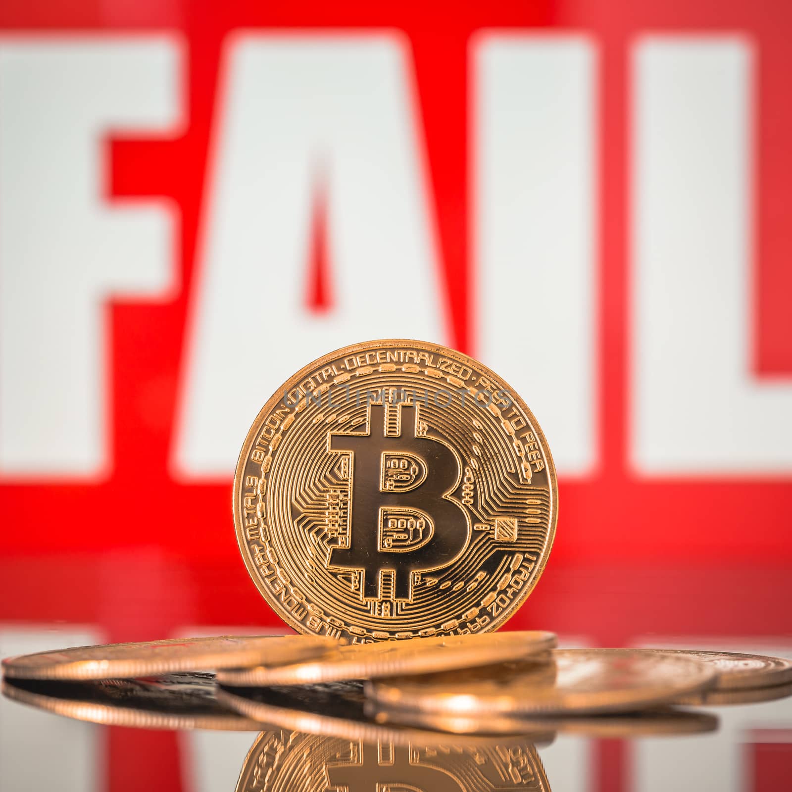Bitcoin and FAIL lettering in the background.