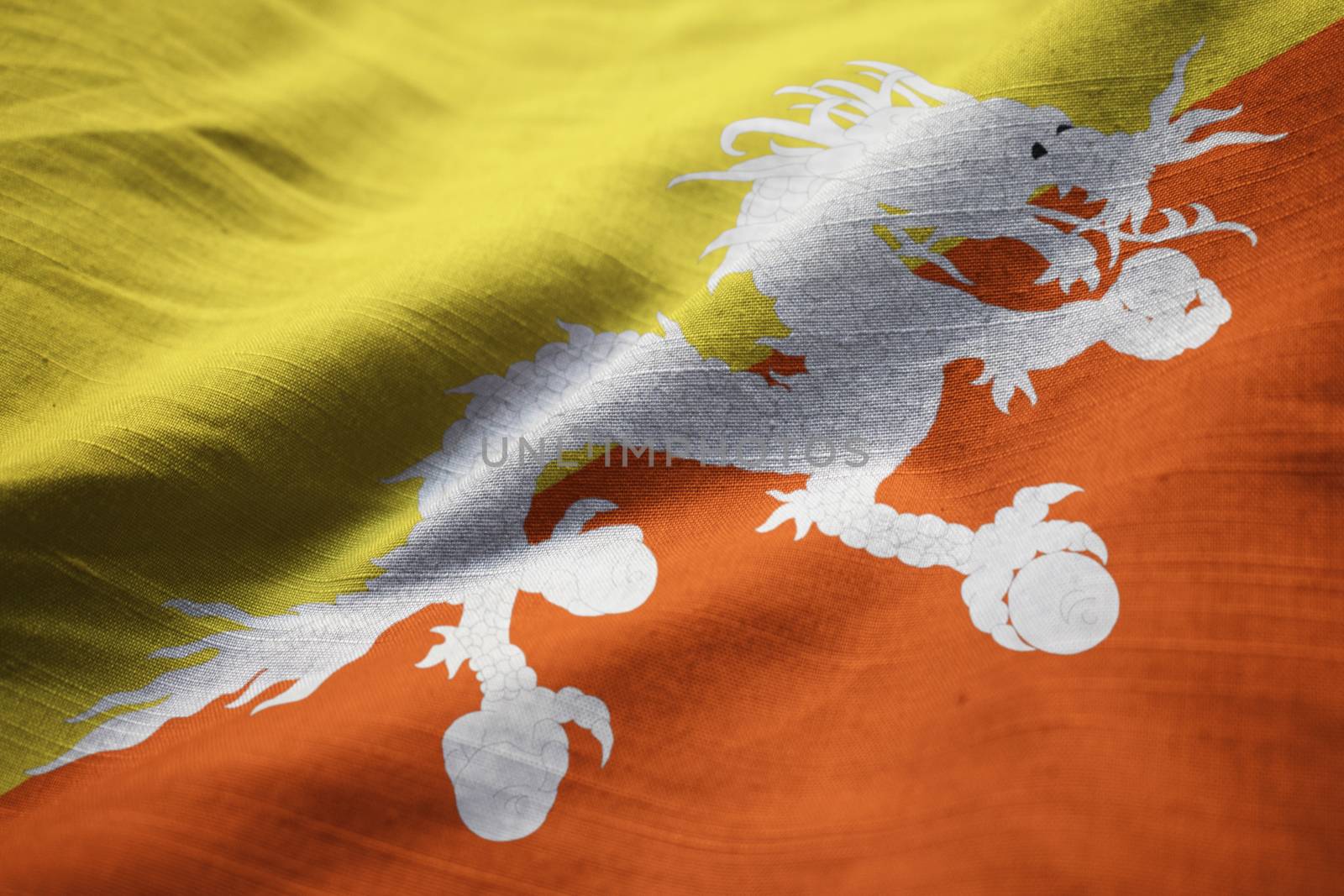 Closeup of Ruffled Bhutan Flag, Bhutan Flag Blowing in Wind