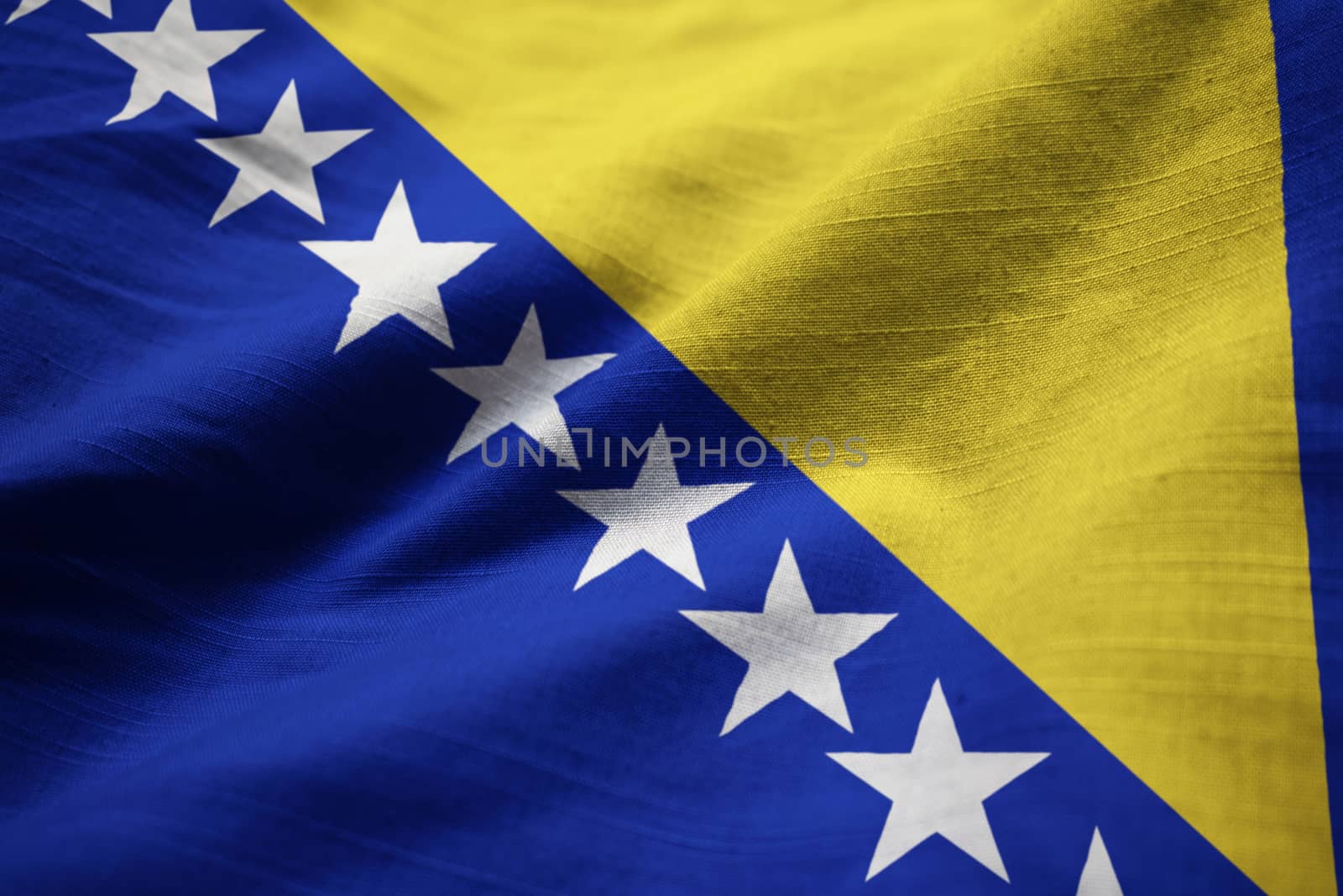 Closeup of Ruffled Bosnia and Herzegovina Flag, Bosnia and Herze by shaadjutt36