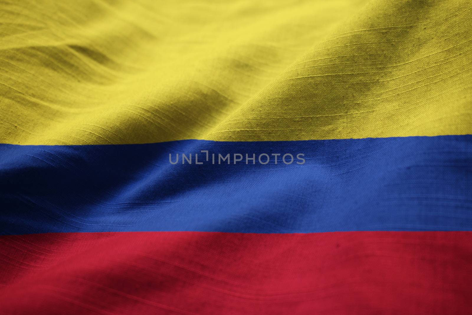 Closeup of Ruffled Colombia Flag, Colombia Flag Blowing in Wind by shaadjutt36