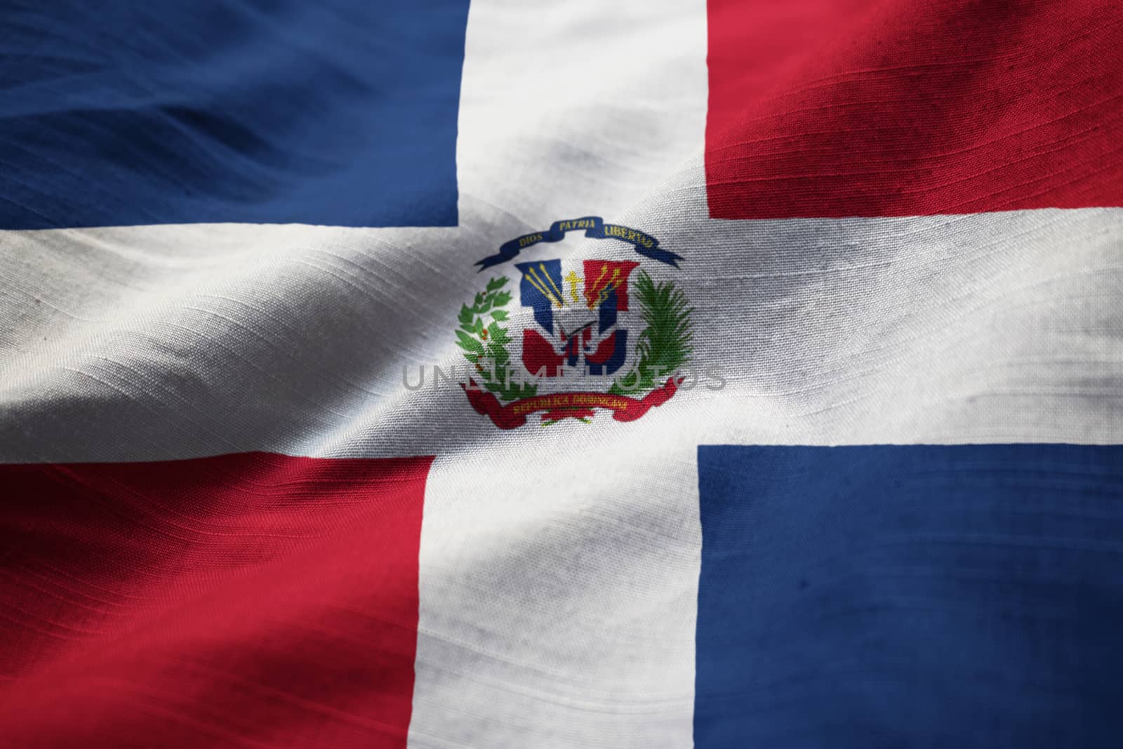 Closeup of Ruffled Dominican Republic Flag, Dominican Republic Flag Blowing in Wind