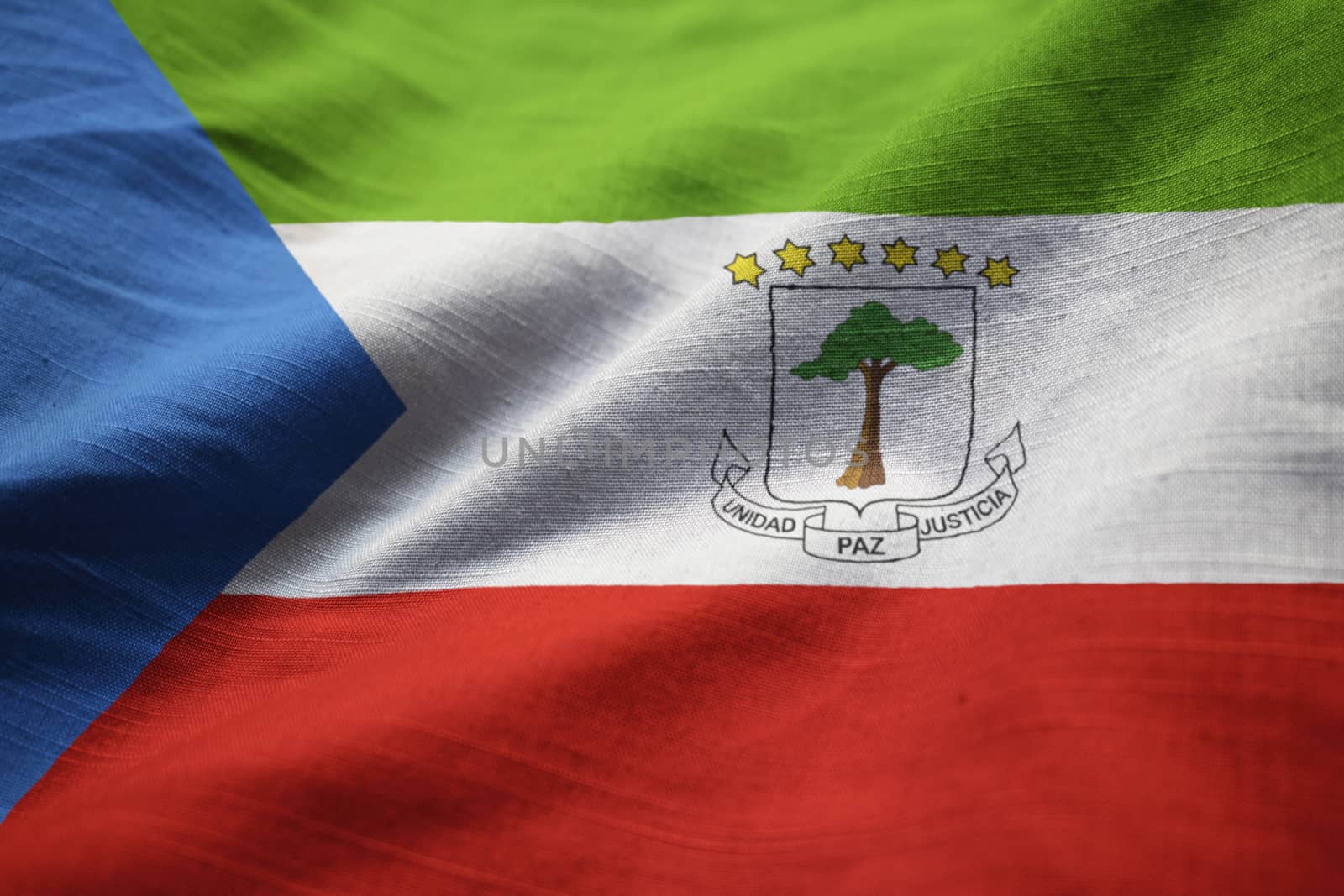 Closeup of Ruffled Equatorial Guinea Flag, Equatorial Guinea Flag Blowing in Wind