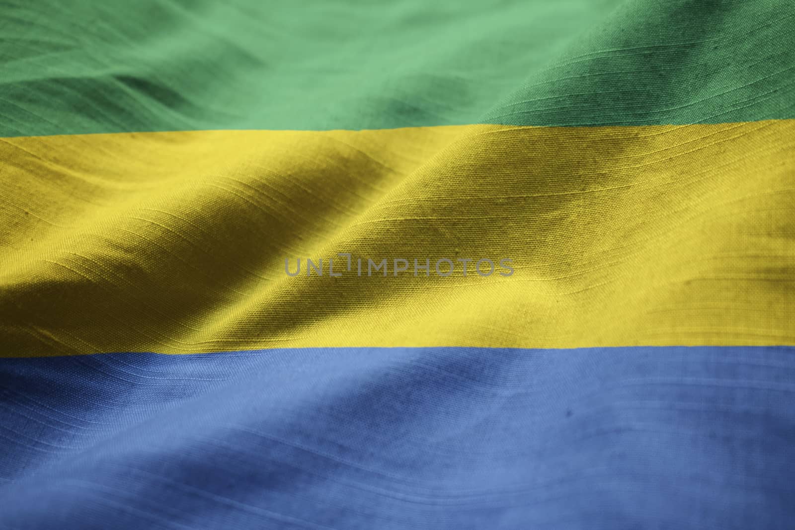 Closeup of Ruffled Gabon Flag, Gabon Flag Blowing in Wind by shaadjutt36