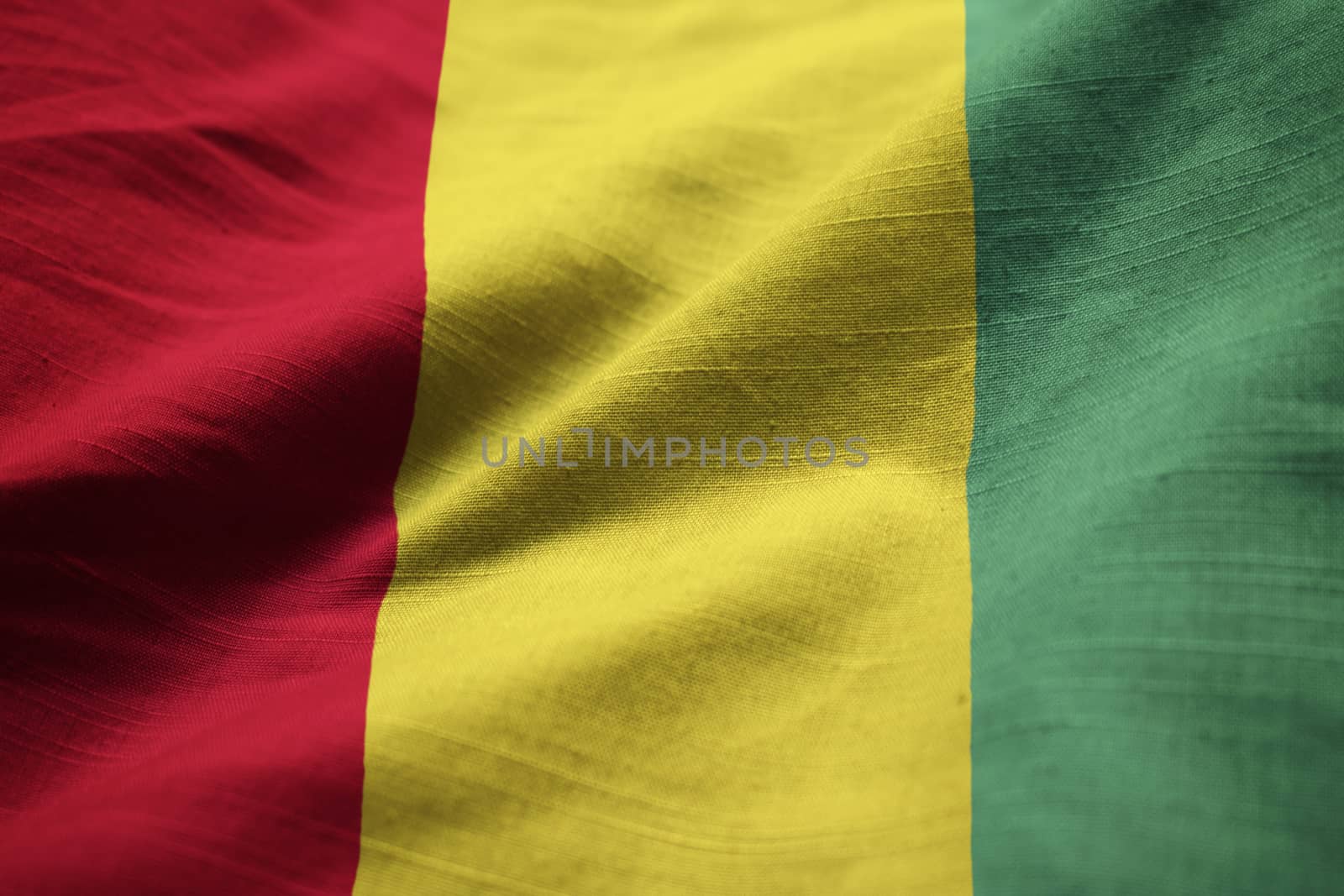 Closeup of Ruffled Guinea Flag, Guinea Flag Blowing in Wind by shaadjutt36