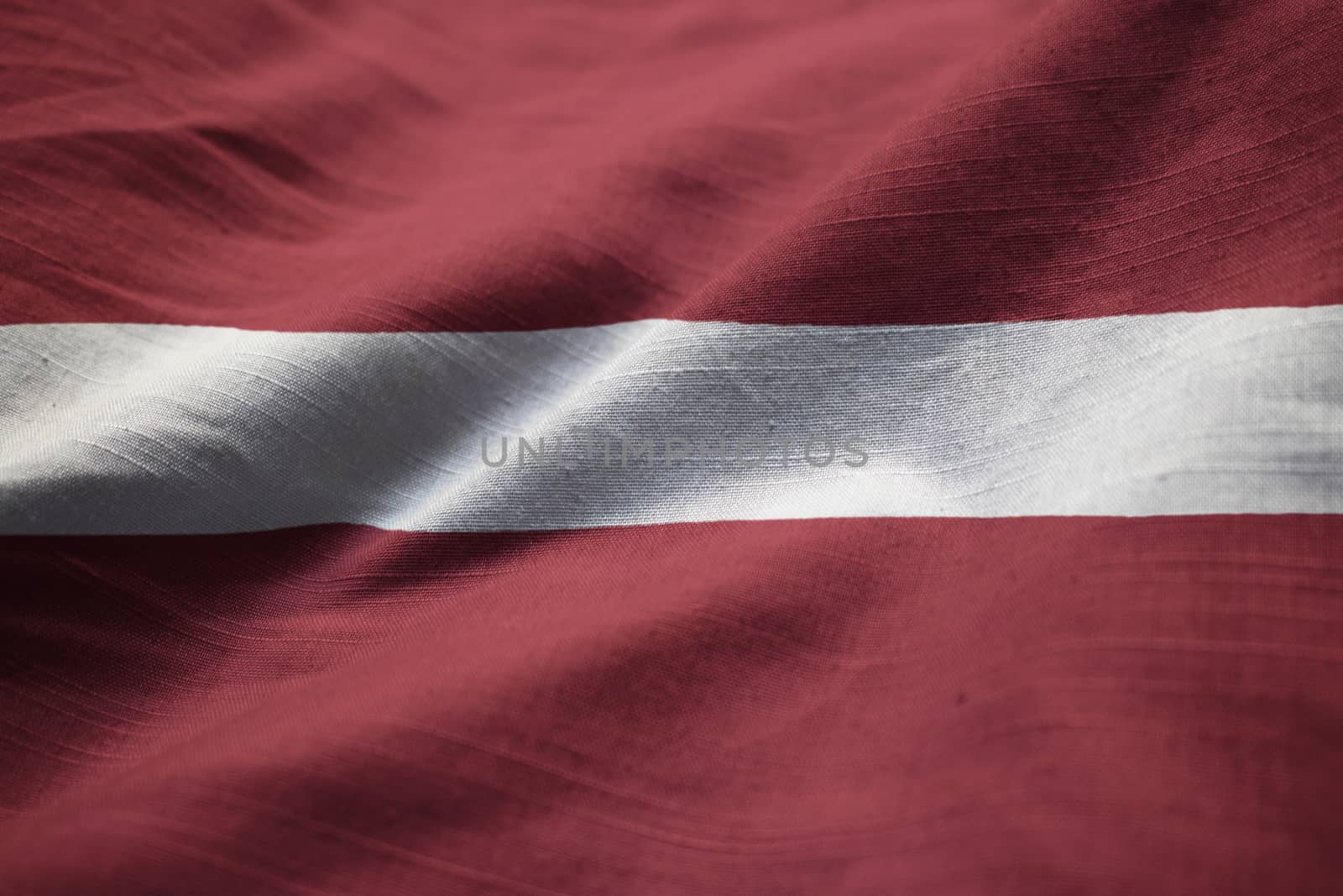 Closeup of Ruffled Latvia Flag, Latvia Flag Blowing in Wind