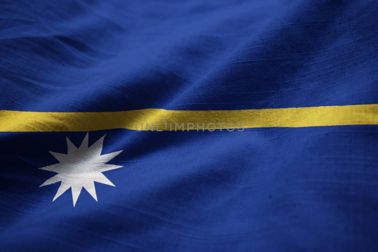 Closeup of Ruffled Nauru Flag, Nauru Flag Blowing in Wind by shaadjutt36