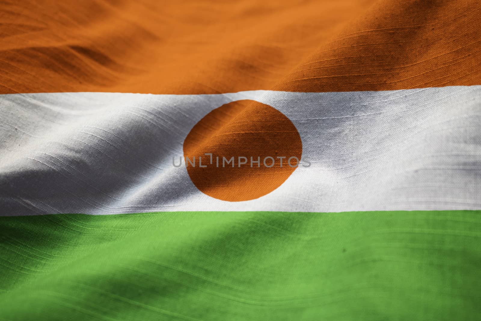 Closeup of Ruffled Niger Flag, Niger Flag Blowing in Wind