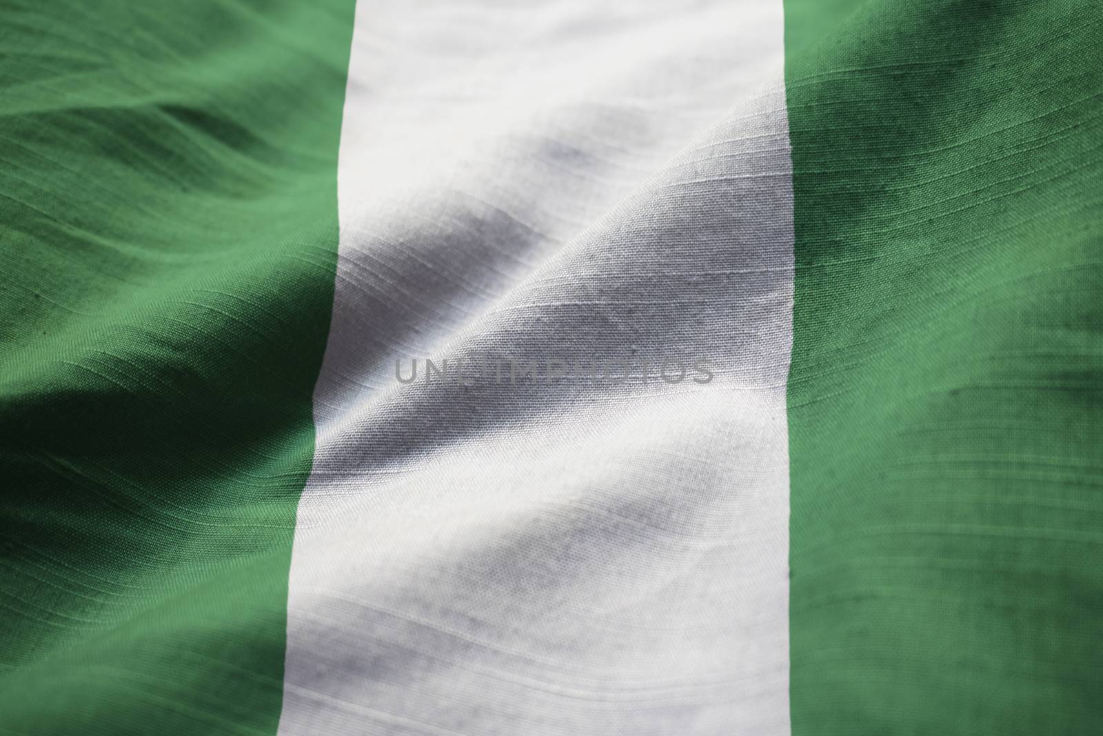 Closeup of Ruffled Nigeria Flag, Nigeria Flag Blowing in Wind by shaadjutt36