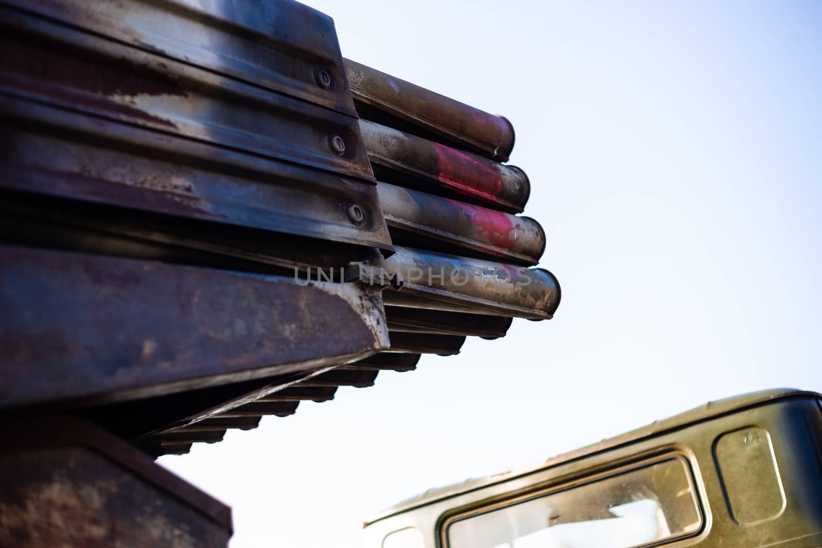 Missile firing system on military armored truck close up view. Rocket launcher closeup.