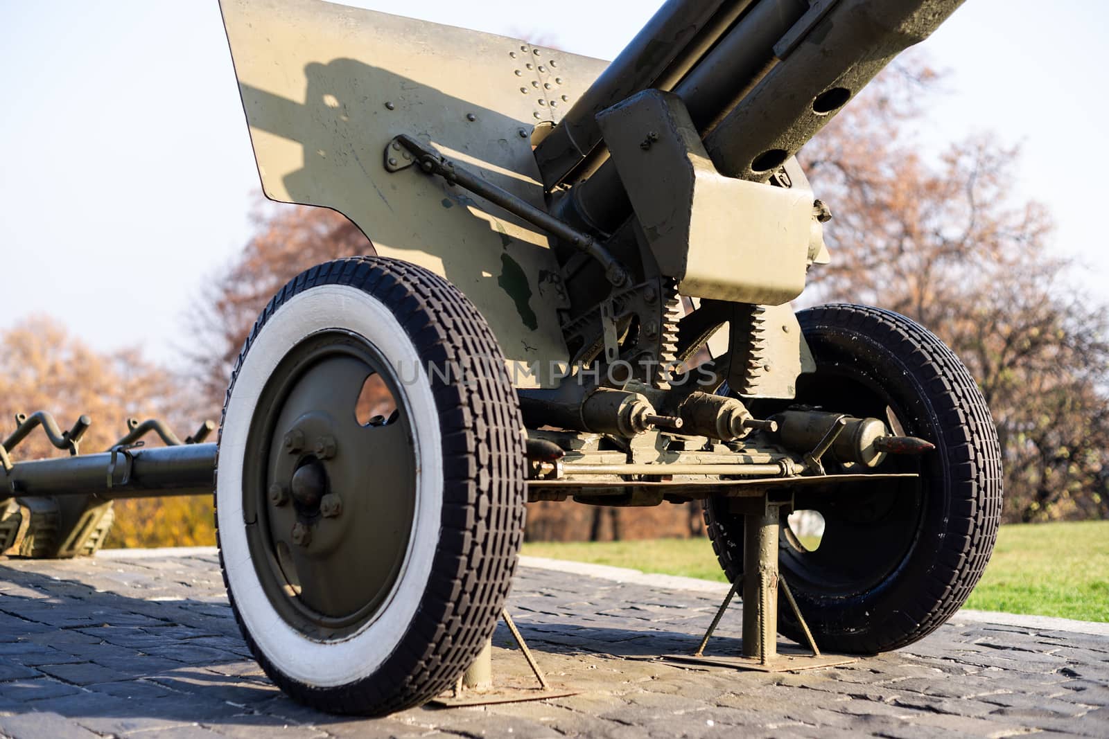 Vintage rare old military artillery cannon at oper air outdoor military vehicles museum.