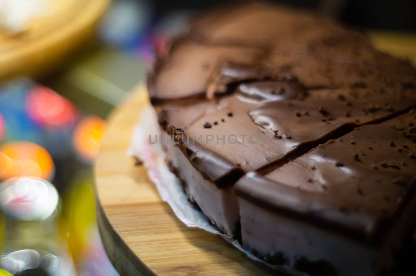 Low light photo some pieces of fresh pie in confectionery fridge on blurred background. Close-up view. by alexsdriver