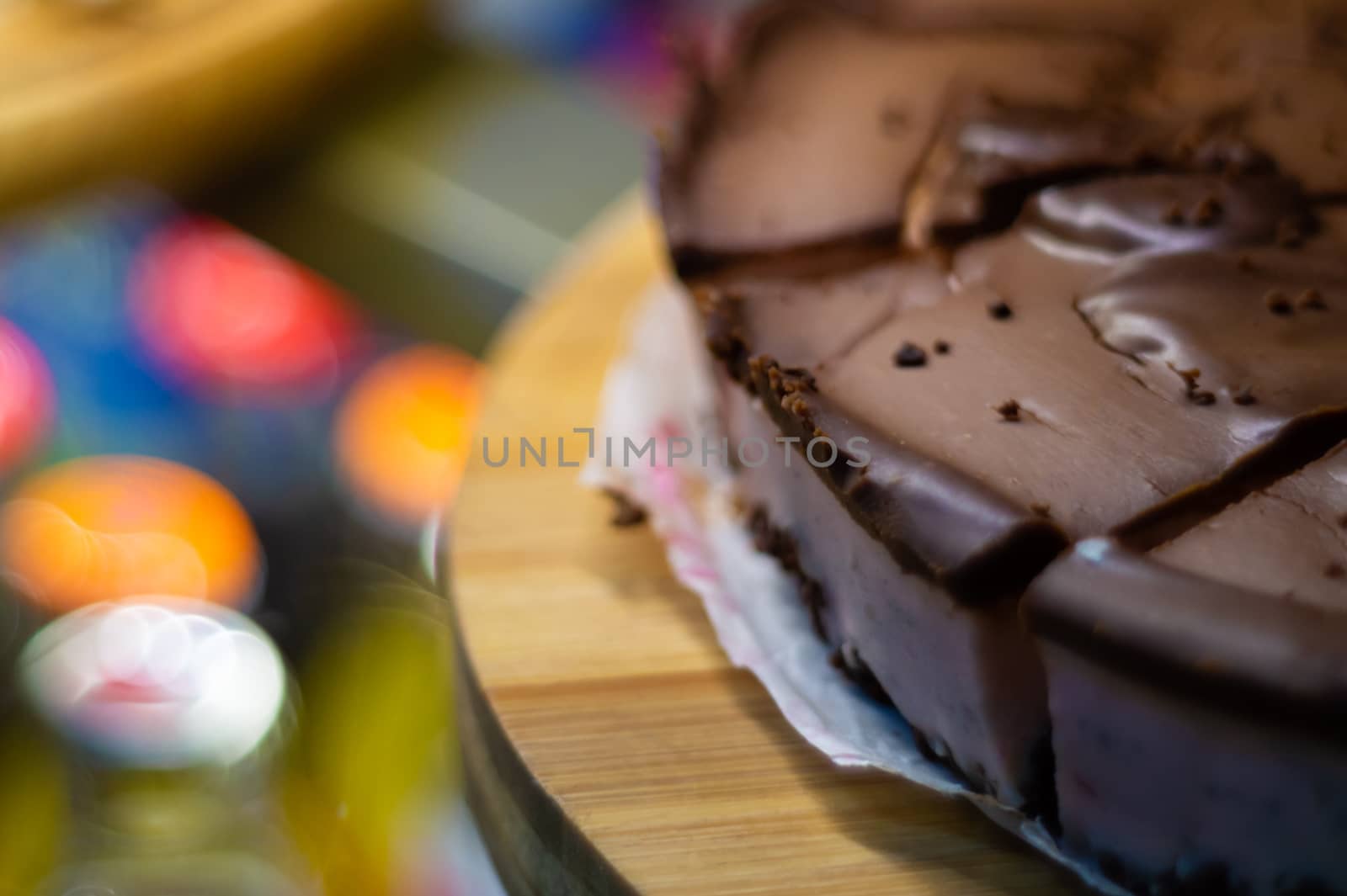 Low light photo some pieces of fresh pie in confectionery fridge on blurred background. Close-up view. by alexsdriver