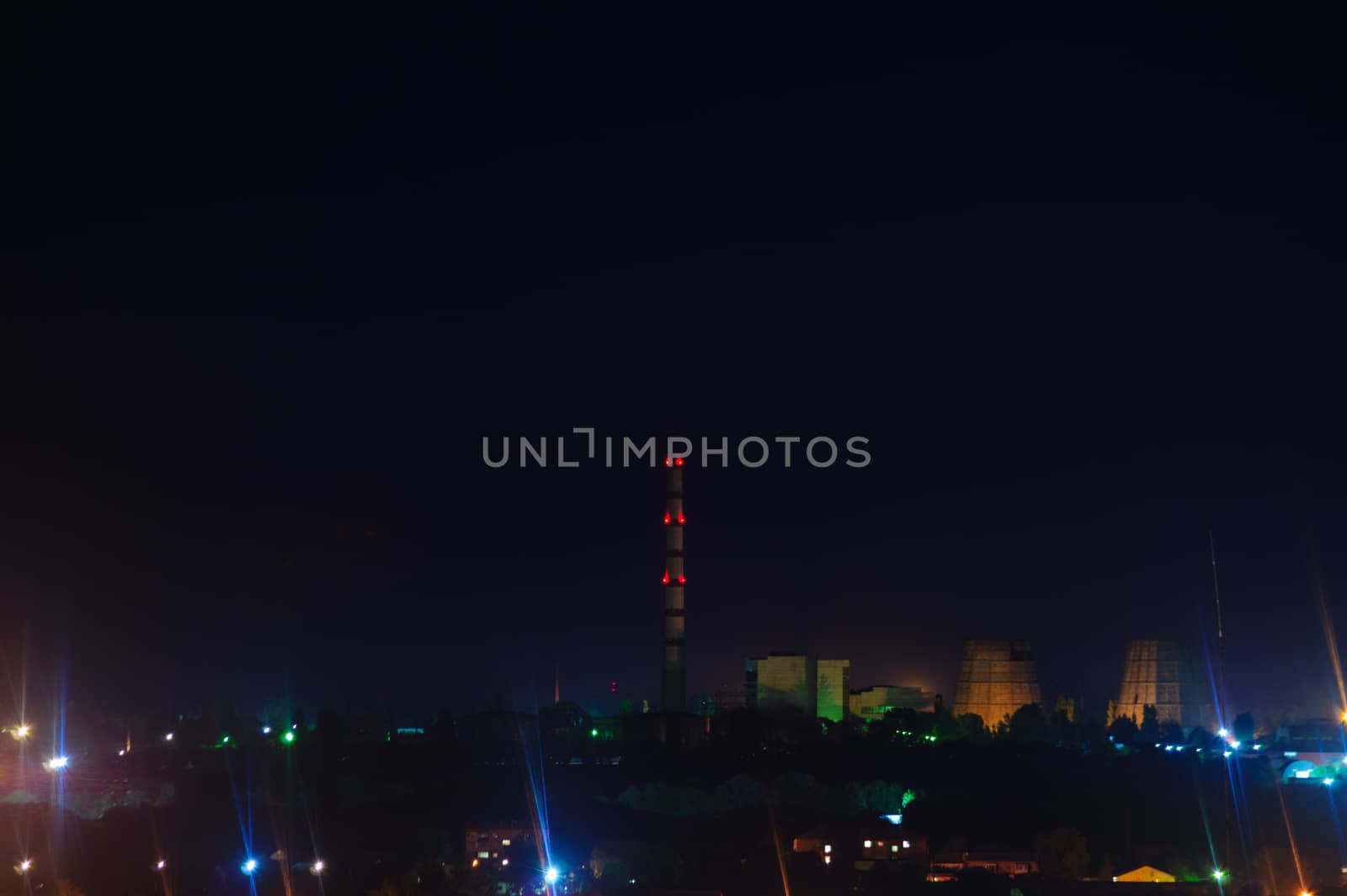 Long exposure night photo. A lot of stars with trees on foreground. Far from the city. Night landscape.
