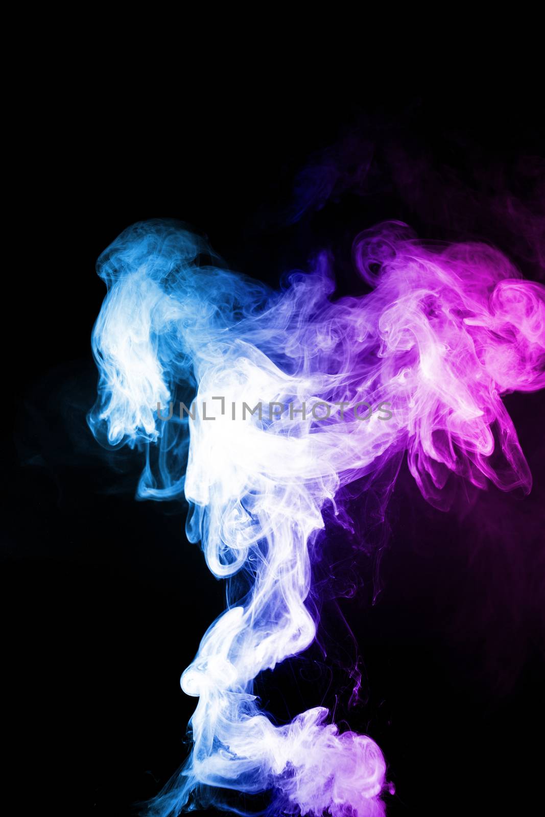 Vape clouds splash with two colours fog is blue and purple colour. Low light photo. Stock isolated on black background color smoke with spray boiling glycerine lines.