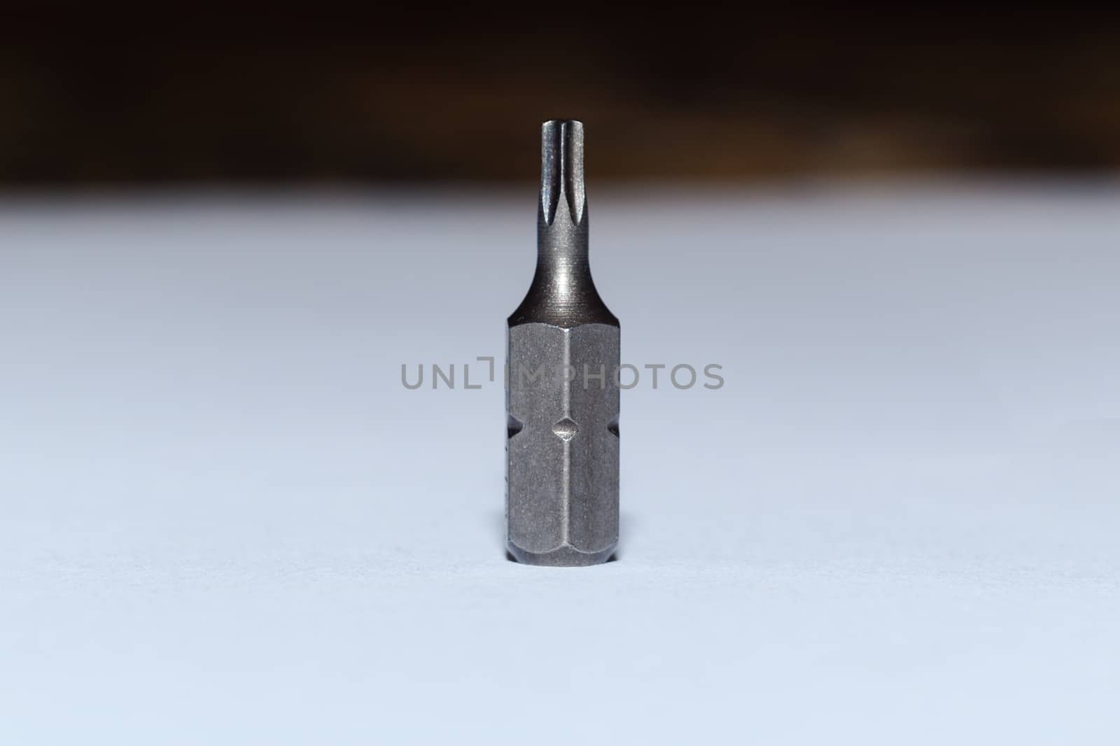 One tool bit on blurred background.
