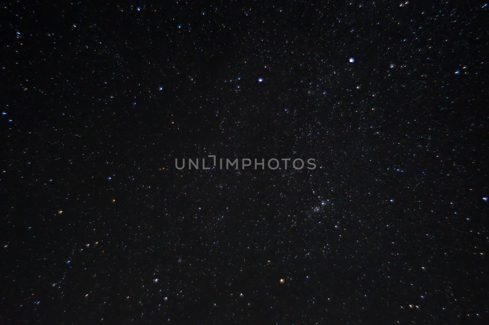 Long exposure night photo. A lot of stars with constellations. Far from the city. Night landscape.