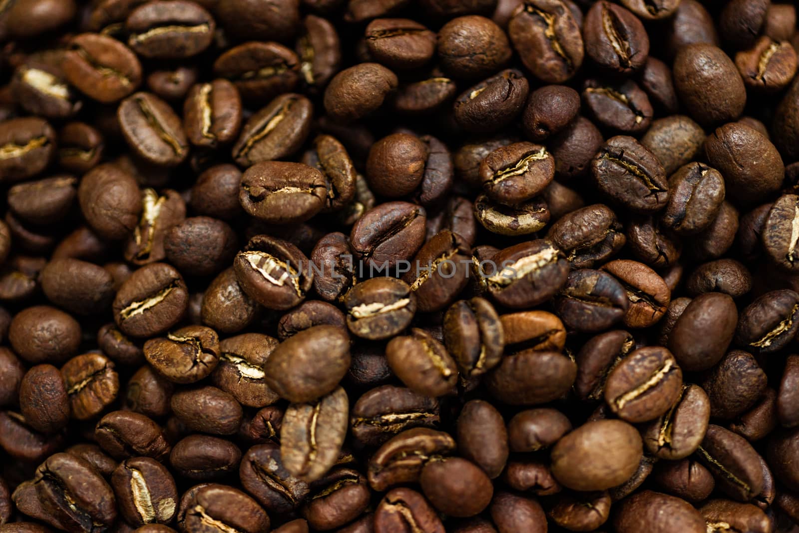 Fresh roasted Arabica coffee beans. Great backgroung. Good for wallpapers or photobackground.