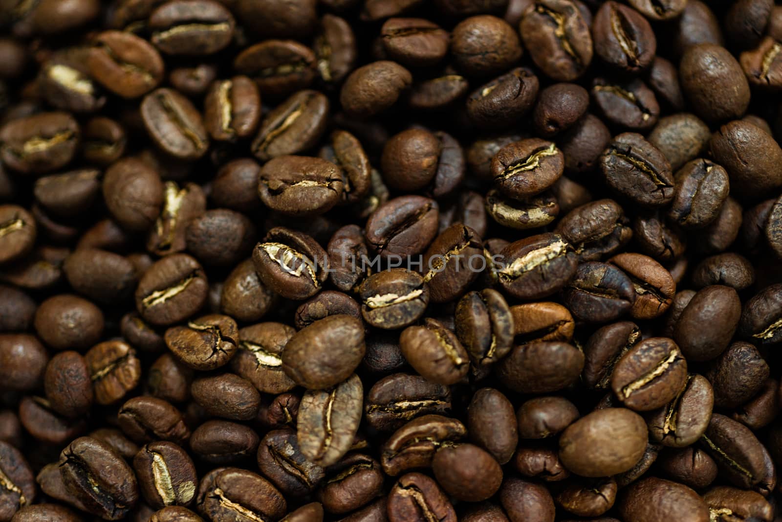 Fresh roasted Arabica coffee beans. Great backgroung. Good for wallpapers or photobackground.