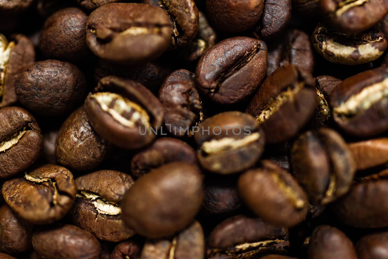 Fresh roasted Arabica coffee beans. Great backgroung. Good for wallpapers or photobackground.