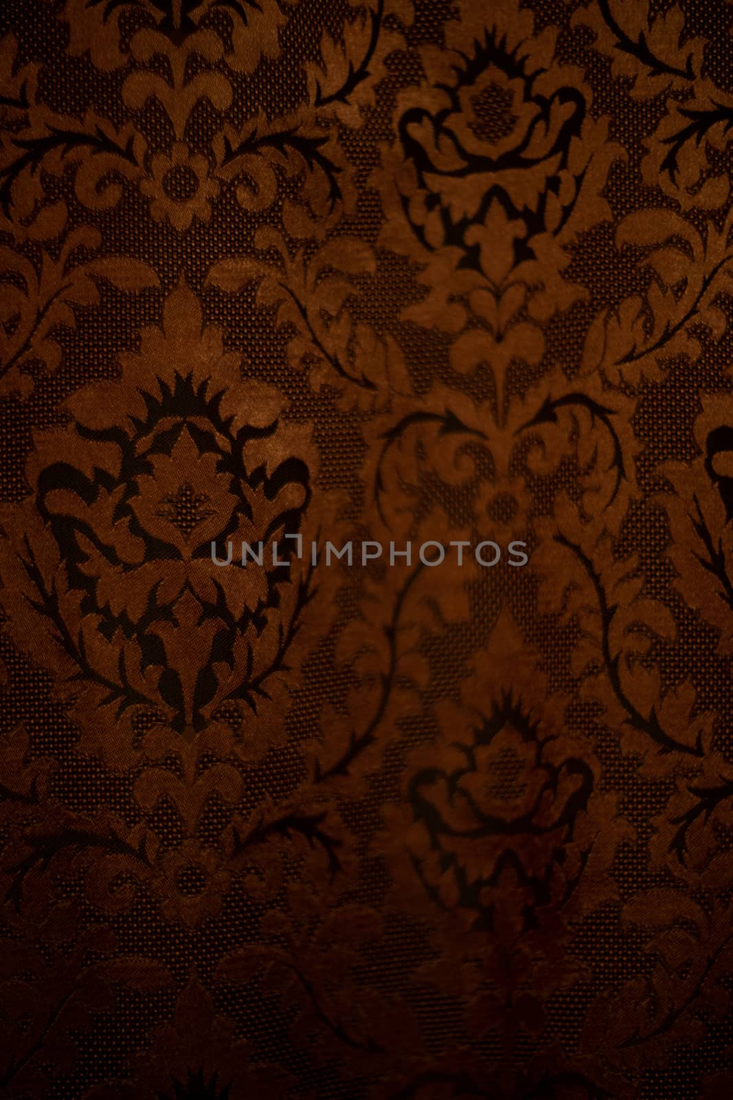 Expensive dark orange home curtains with a very beautiful frilly pattern. Texture shot. Good background or wallpapers. by alexsdriver