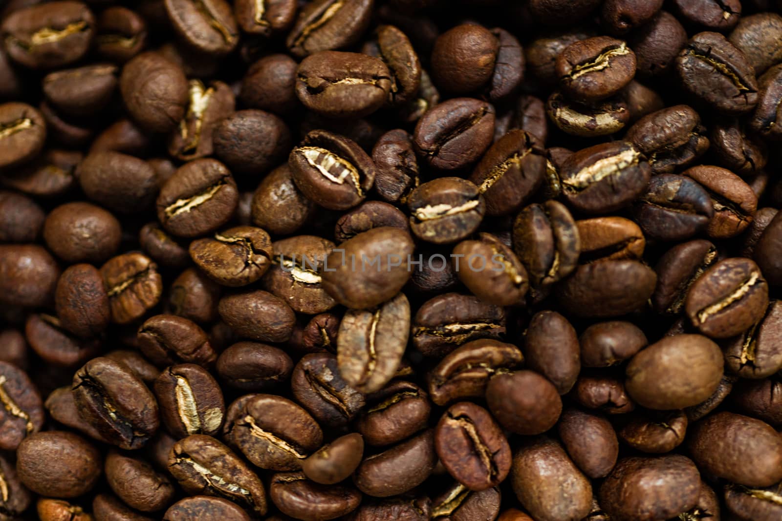 Fresh roasted Arabica coffee beans. Great backgroung. Good for wallpapers or photobackground.