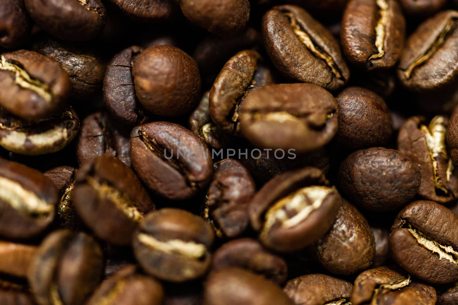 Fresh roasted Arabica coffee beans. Great backgroung. Good for wallpapers or photobackground.