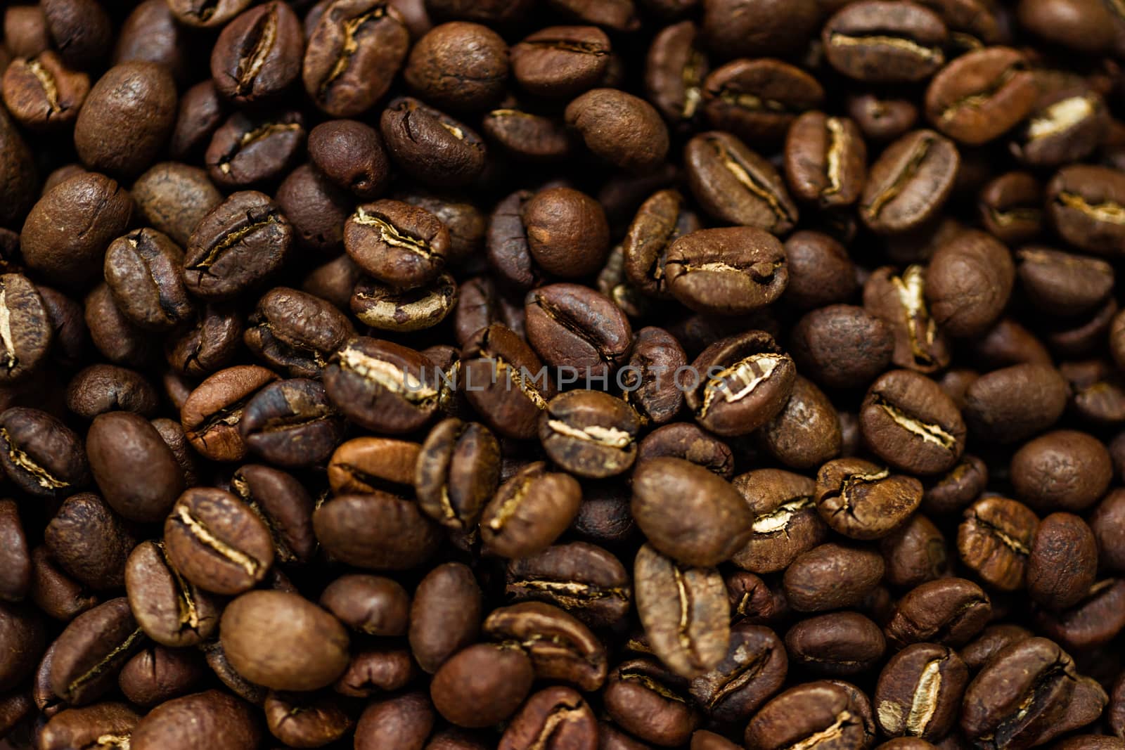Fresh roasted Arabica coffee beans. Great backgroung. Good for wallpapers or photobackground.