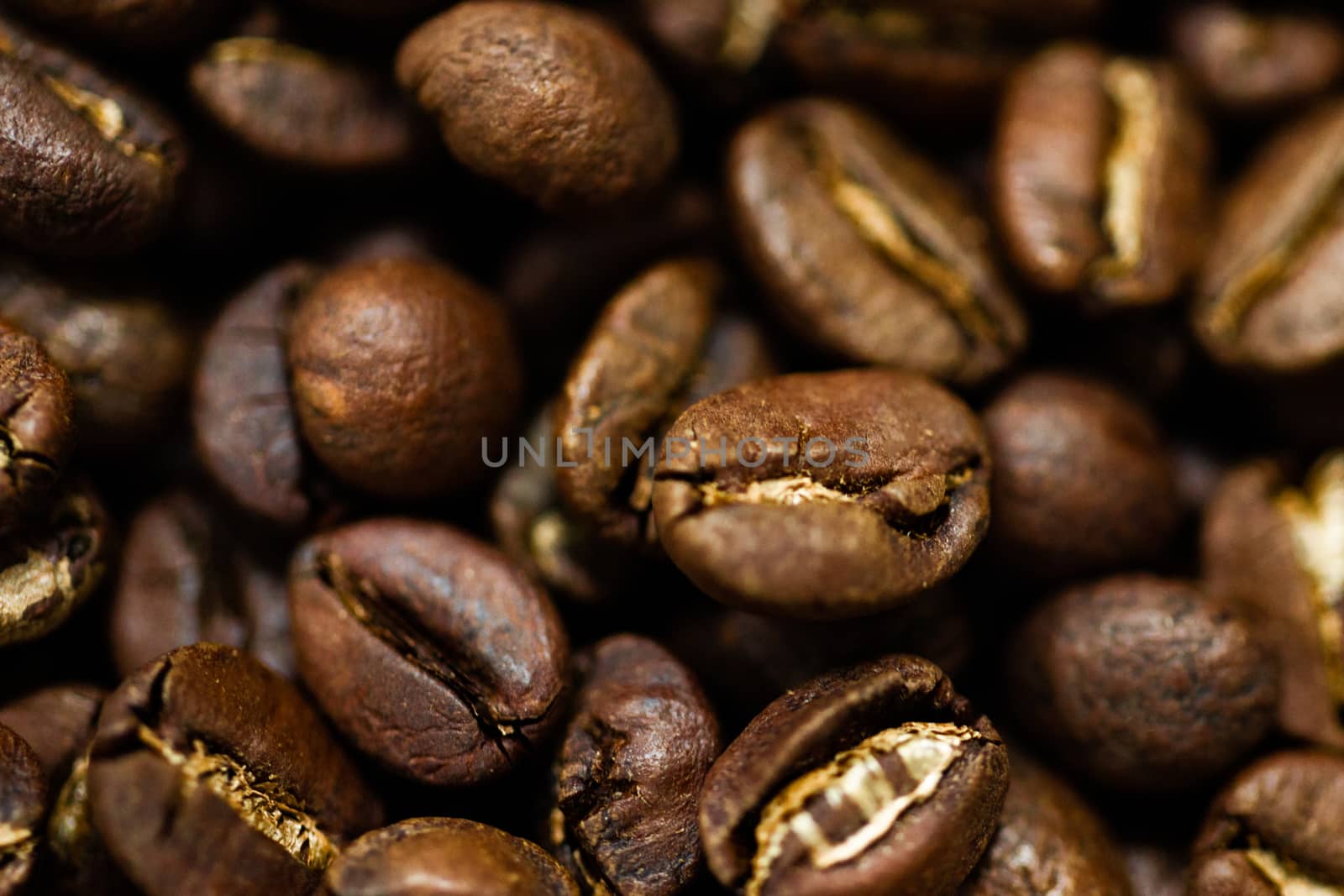 Fresh roasted Arabica coffee beans. Great backgroung. Good for wallpapers or photobackground.