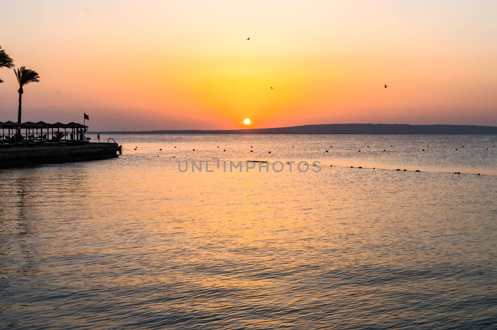 Sunset over the Red Sea seen from a hotel  by Philou1000