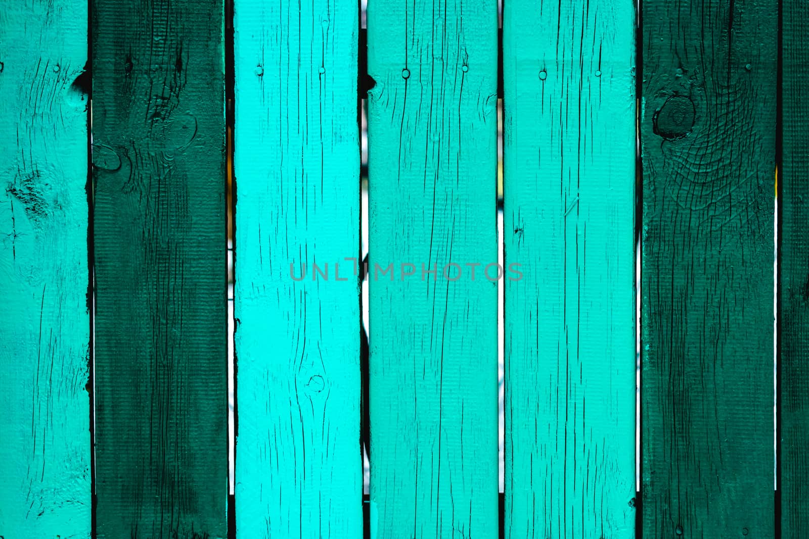 painted fence of wooden boards