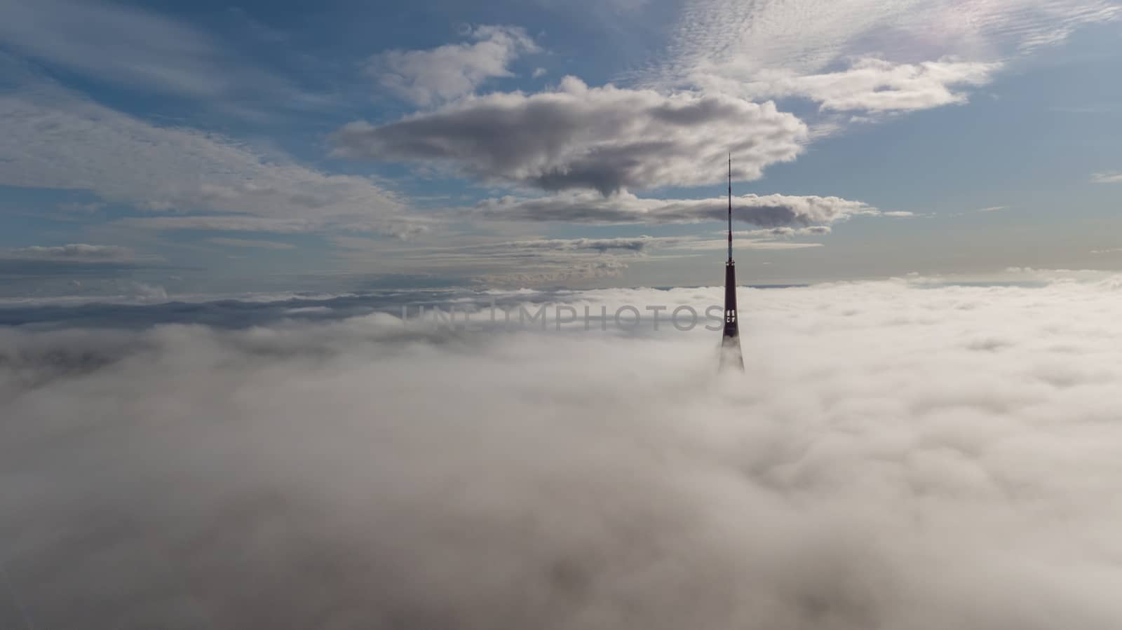 Riga Latvia Tv Tower Zakusala smoke clouds Europe biggest Aerial drone top view