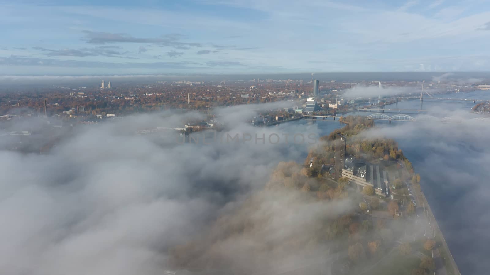 Riga Latvia Daugava river Zakusala island smoke cloud island Aerial drone top view