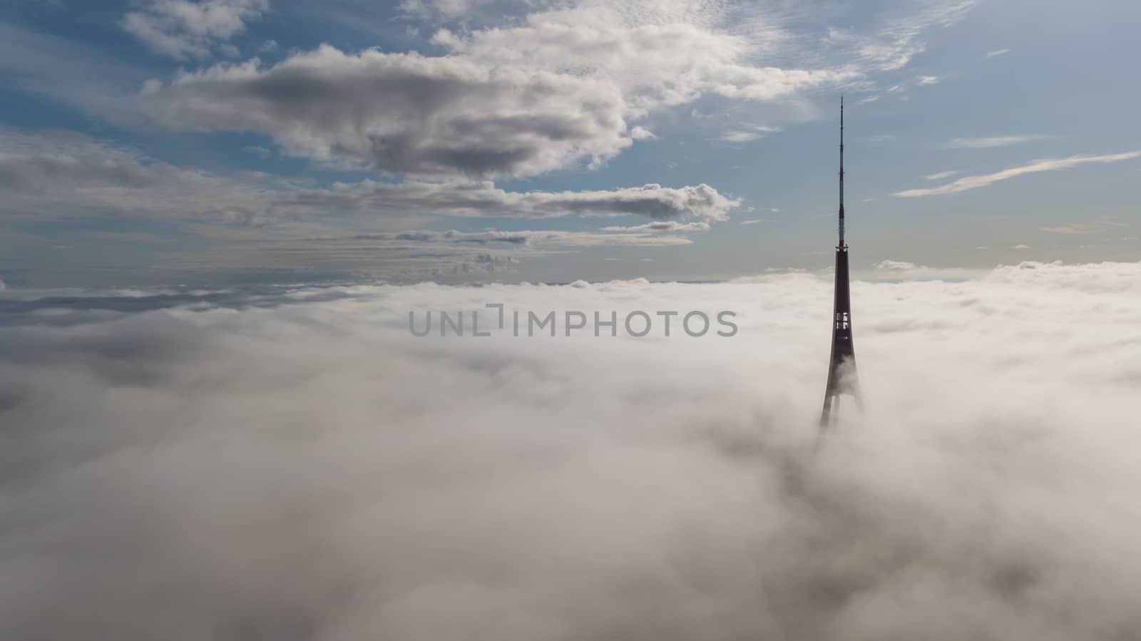 Riga Latvia Tv Tower Zakusala smoke clouds Europe biggest Aerial drone top view