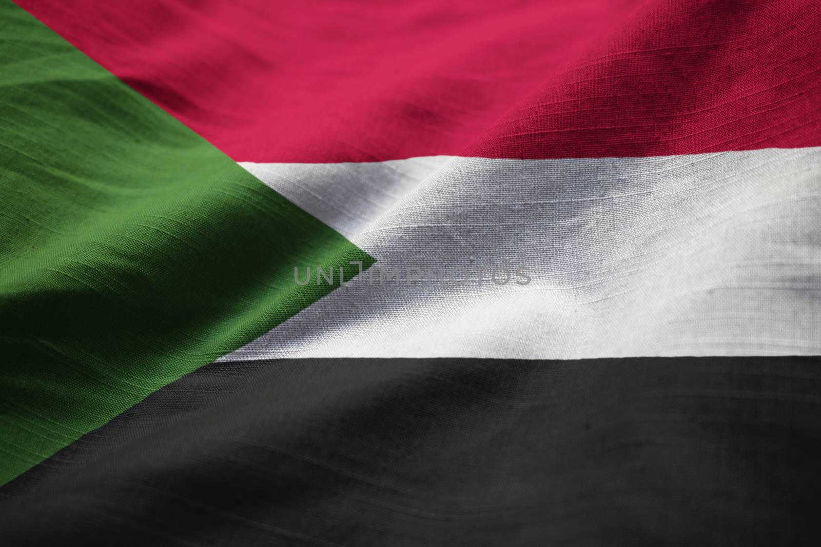 Closeup of Ruffled Sudan Flag, Sudan Flag Blowing in Wind by shaadjutt36