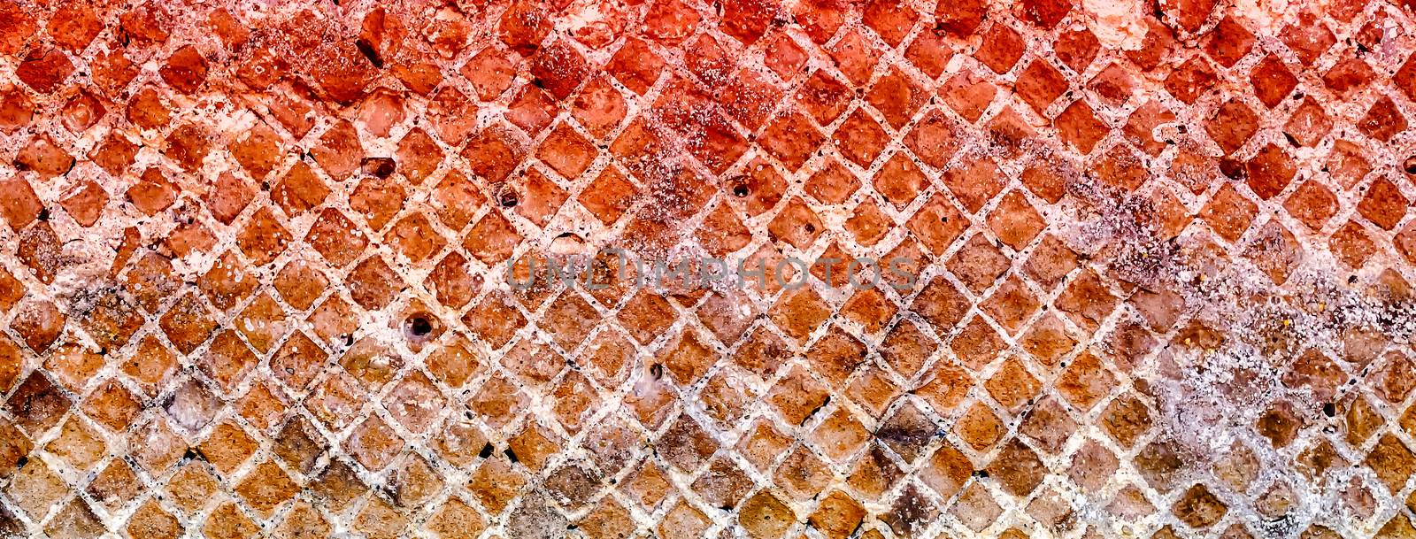 Red Stone Brick Wall Texture with copy space, may use as background