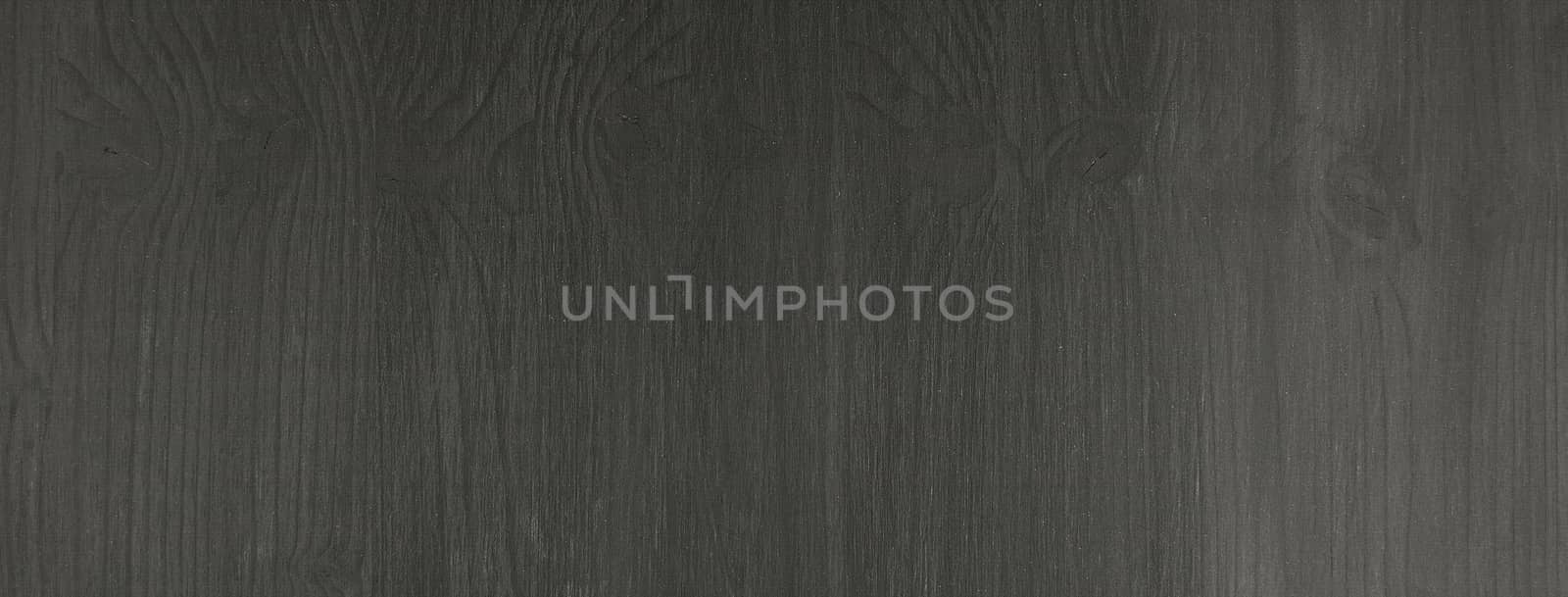 Texture of a black wooden board. May be used as background