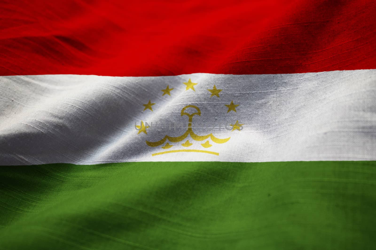 Closeup of Ruffled Tajikistan Flag, Tajikistan Flag Blowing in W by shaadjutt36