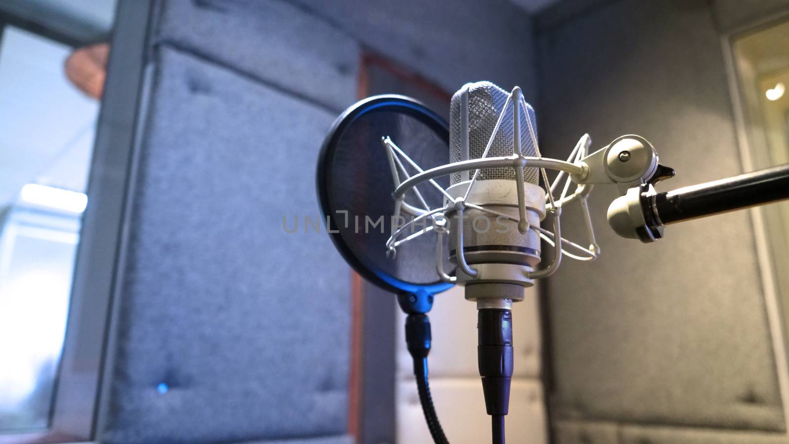 Studio microphone with shock mount and pop filter  by gnepphoto