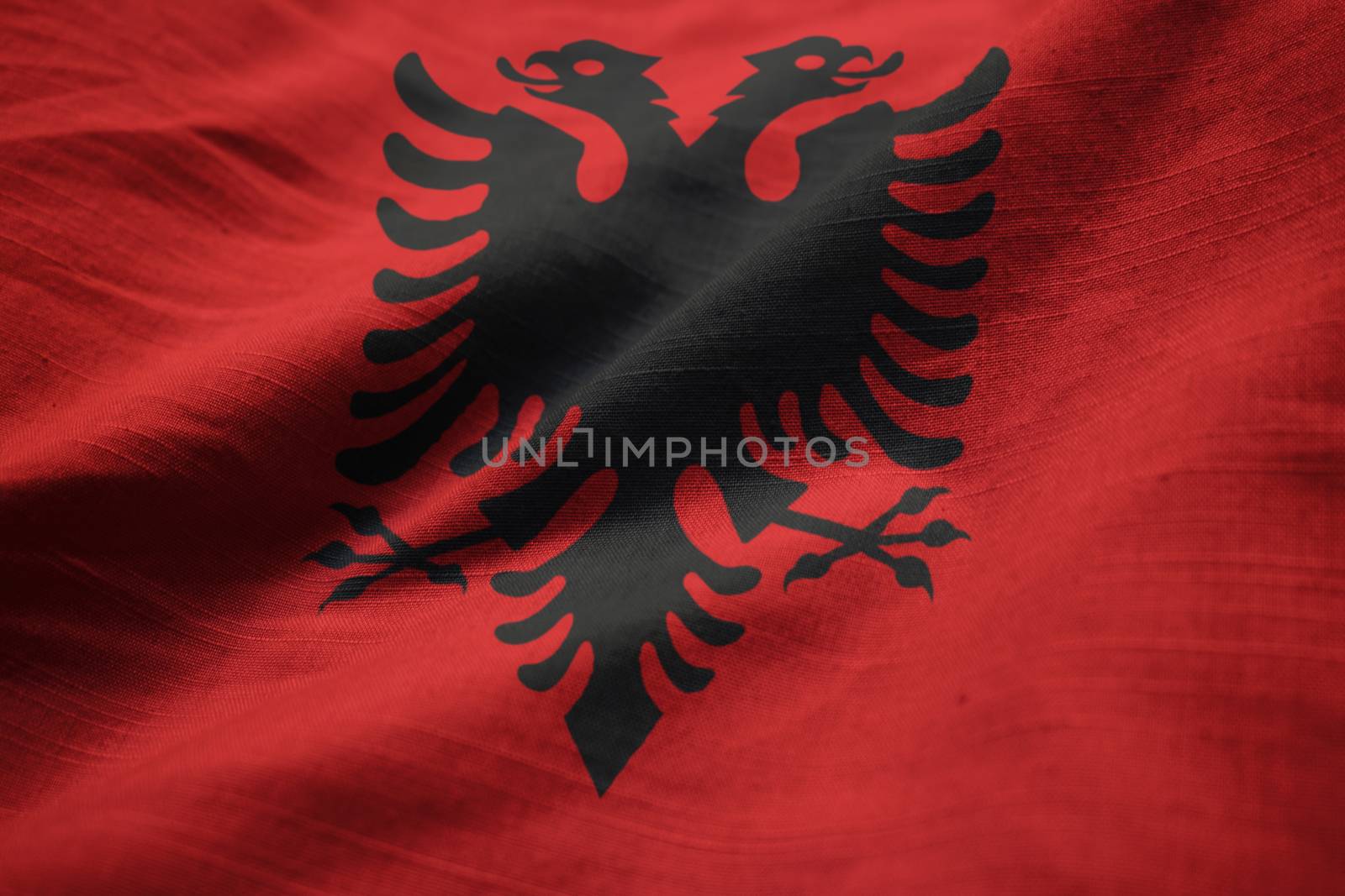 Closeup of Ruffled Albania Flag, Albania Flag Blowing in Wind by shaadjutt36