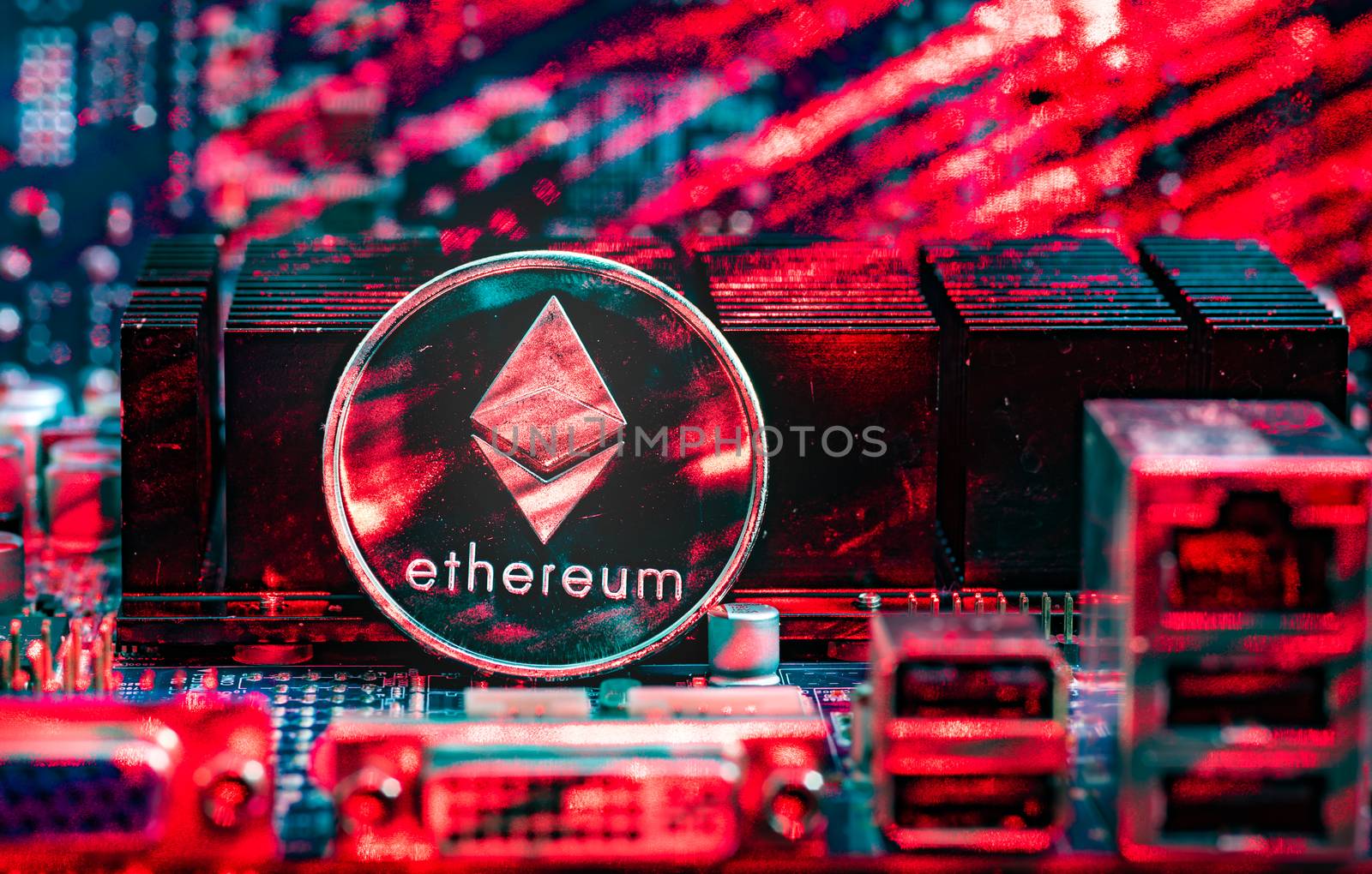 Front view of Ethereum(ETH) cryptocurrency painted with laser stand on computer video card.Bitcoin mining farm concept.
