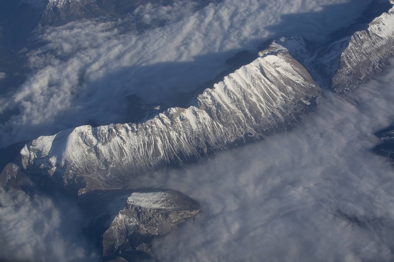 Swiss Alpes with snowy mountain tops aerial  by ArtesiaWells