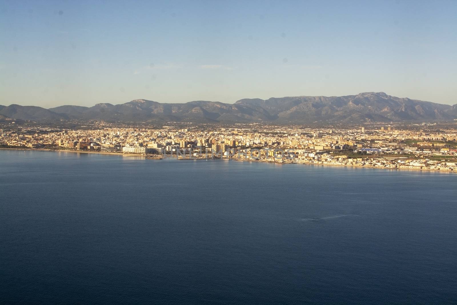 Aerial view of city coastline on a sunny winter day  by ArtesiaWells